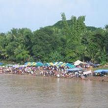 Crowd on the boat racing festival on the Nam Khan River
